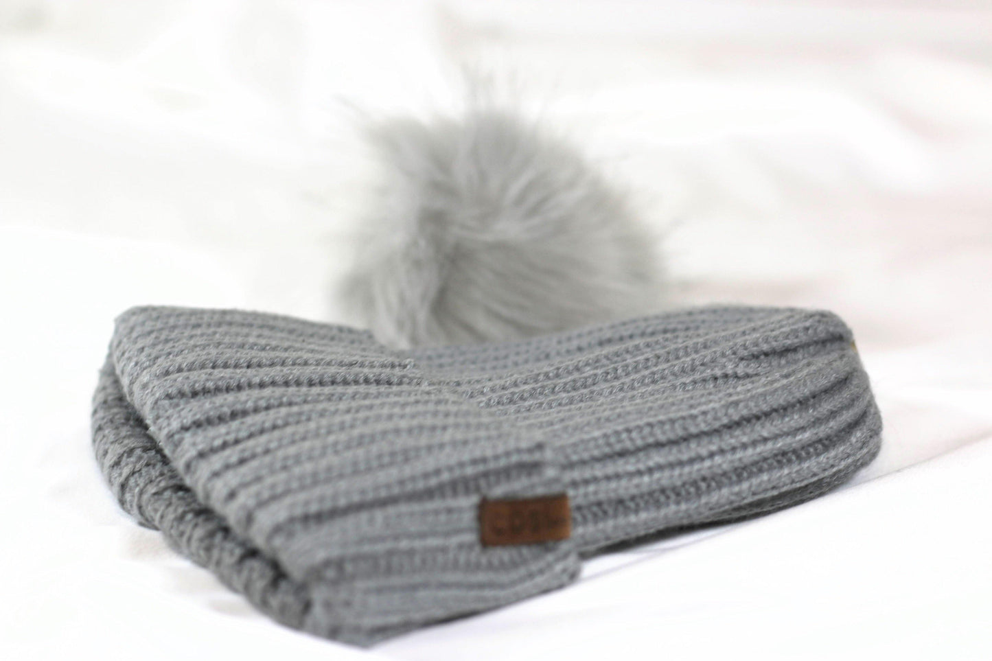 The Knit Pom in Grey - COSI & co.