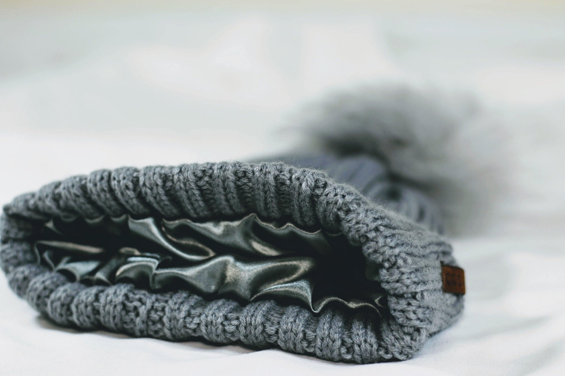 The Knit Pom in Grey - COSI & co.